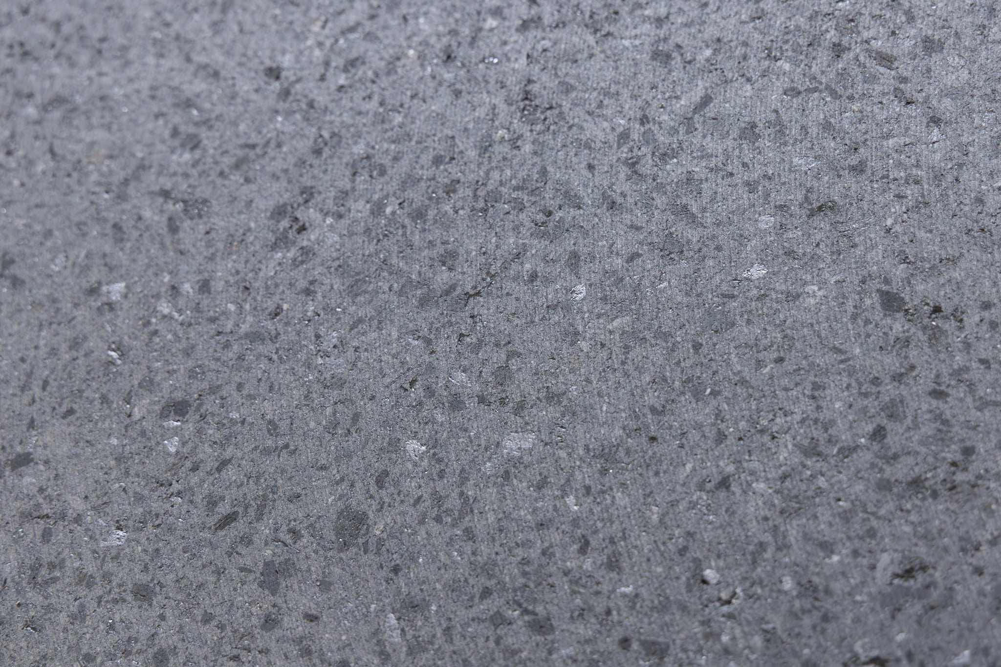 Graphite in Refractory Materials A close-up of a graphite carbon block showing its crystalline structure, highlighting the importance of graphite in refractories