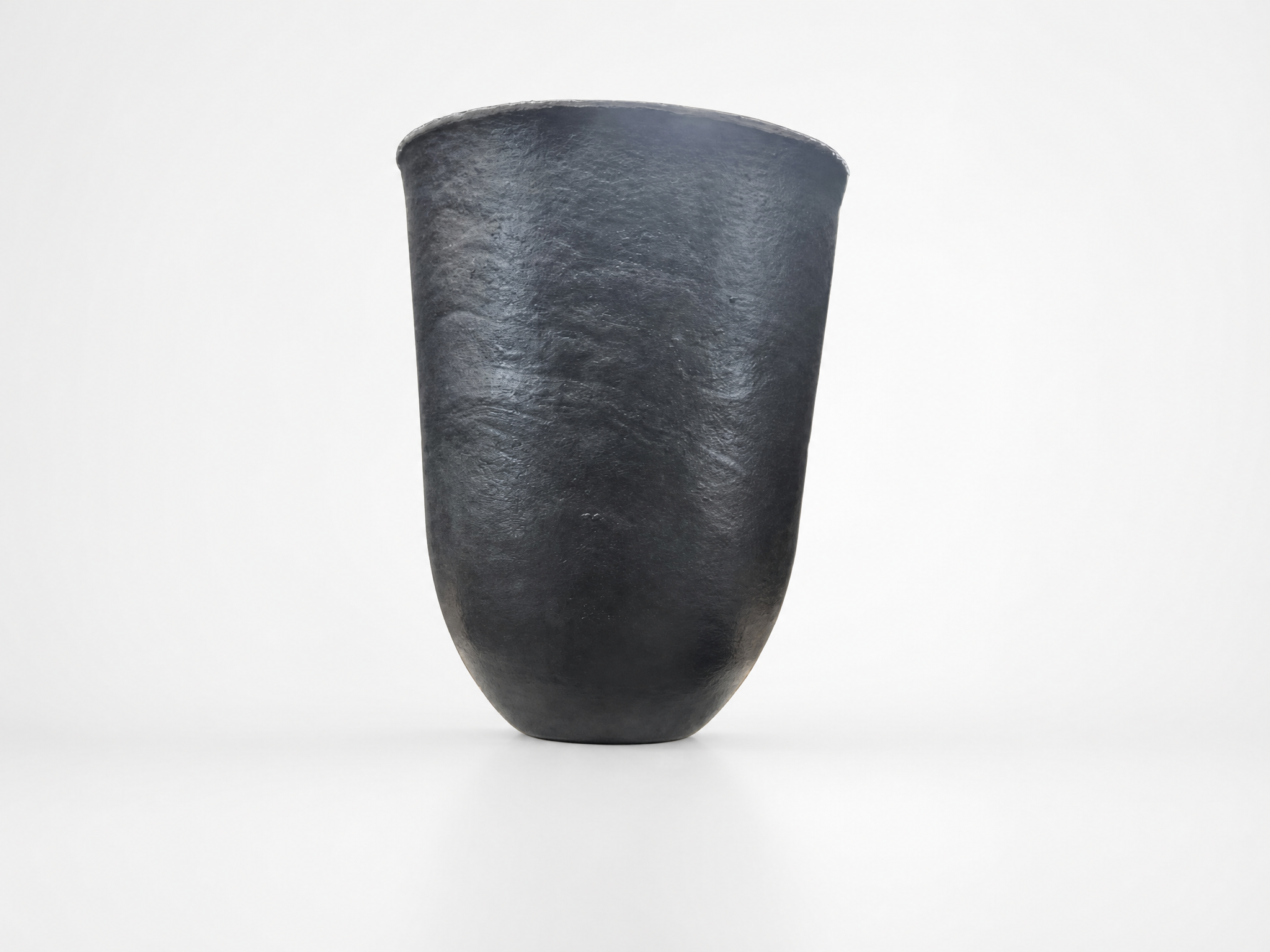 Extruded graphite crucible product